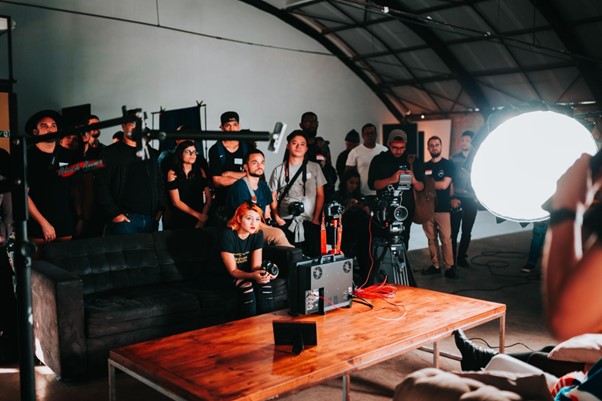 Photo by Matheus Bertelli: https://www.pexels.com/photo/group-of-people-standing-beside-table-inside-room-2608515/ 